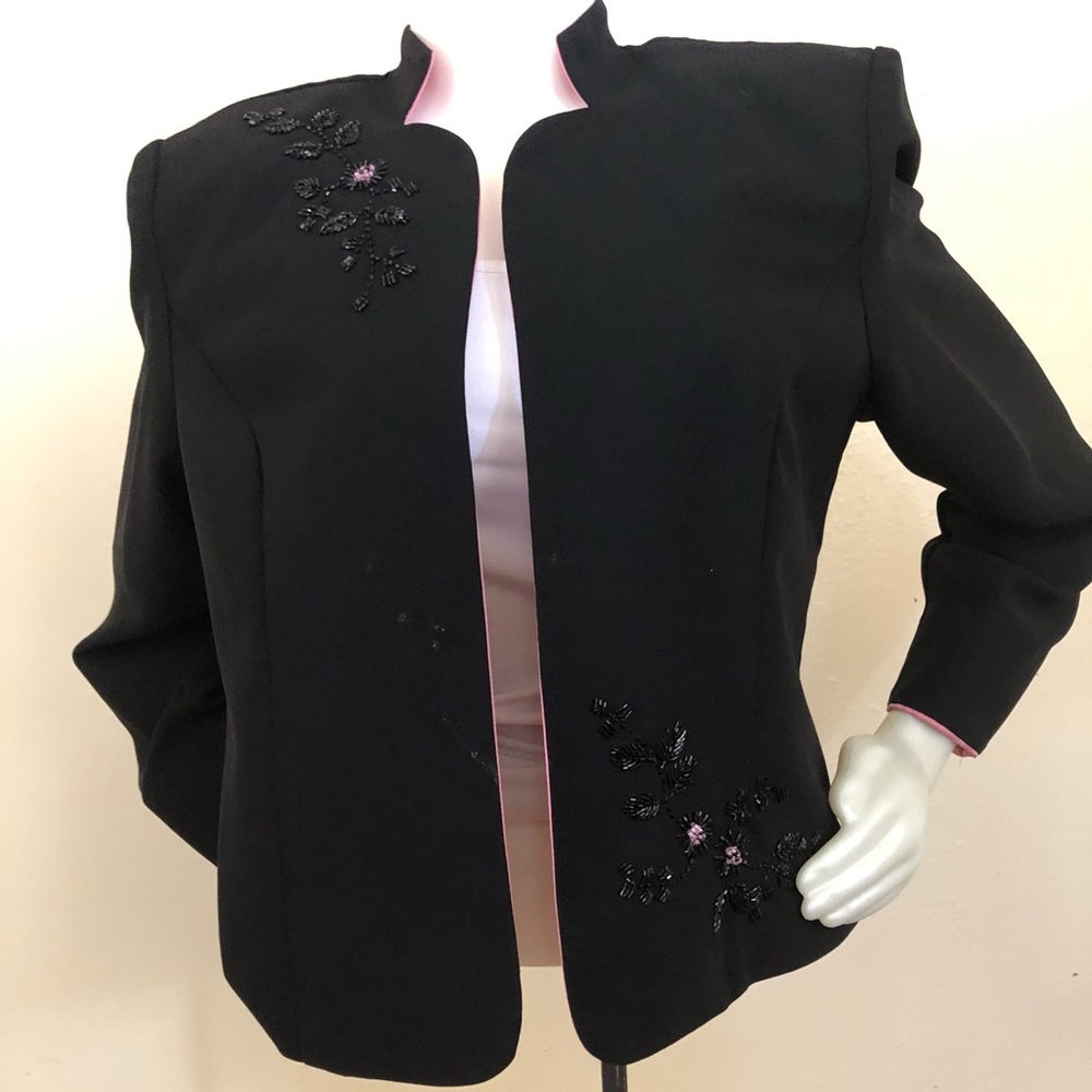 Black jacket with pink accents